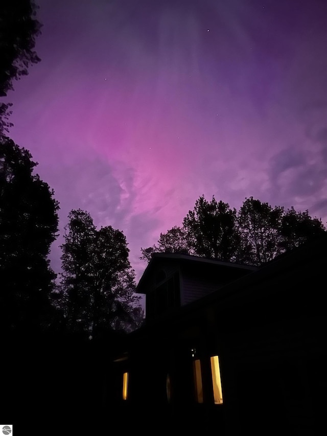 view of property exterior at dusk