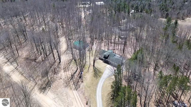 bird's eye view featuring a forest view