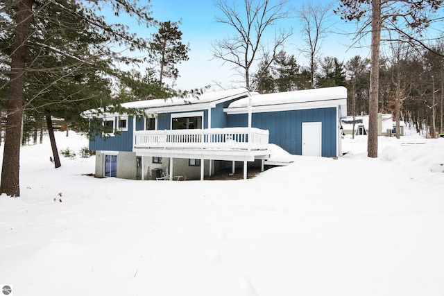 view of front of home with a wooden deck