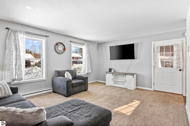 carpeted living room with a baseboard radiator