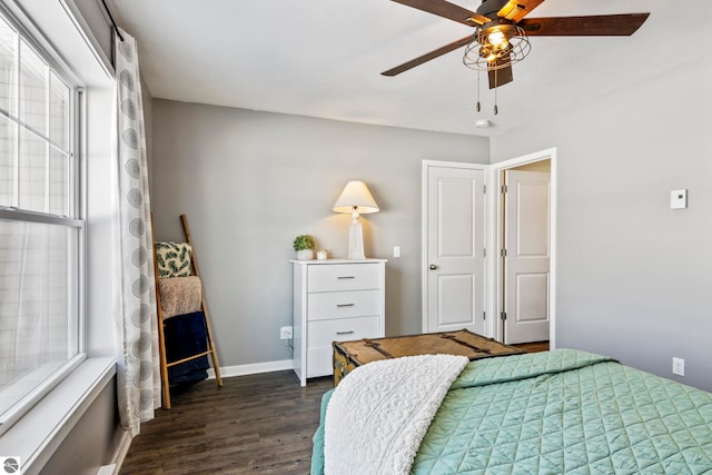 bedroom with dark wood-type flooring and ceiling fan