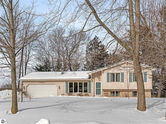 view of front of property featuring a garage