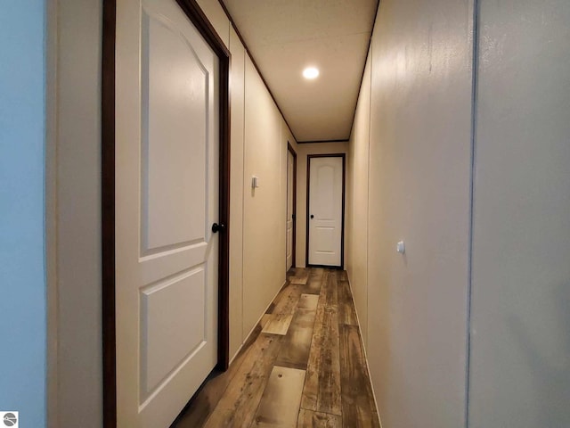 corridor with light wood-type flooring