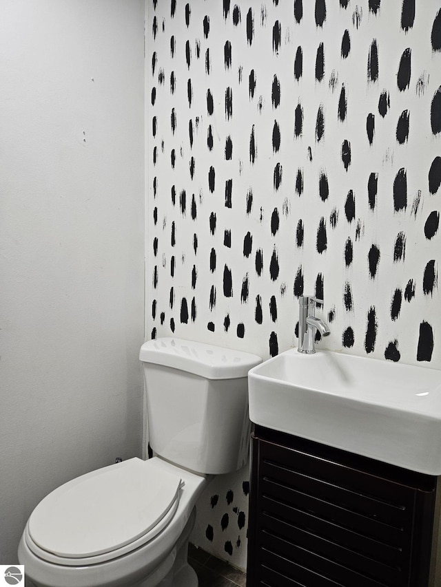 bathroom with vanity and toilet