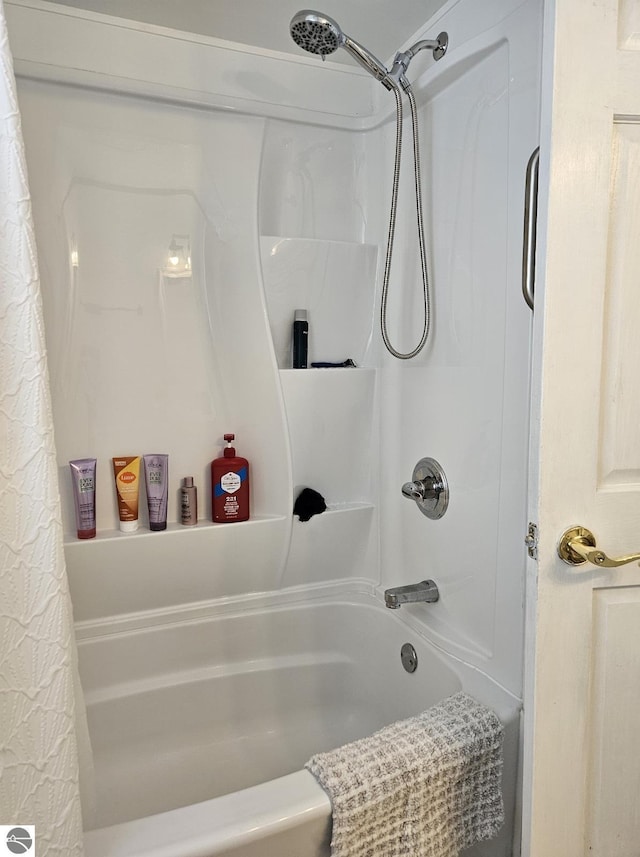 bathroom featuring shower / bath combination with curtain