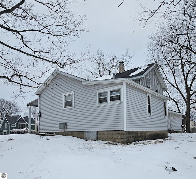 view of snow covered property