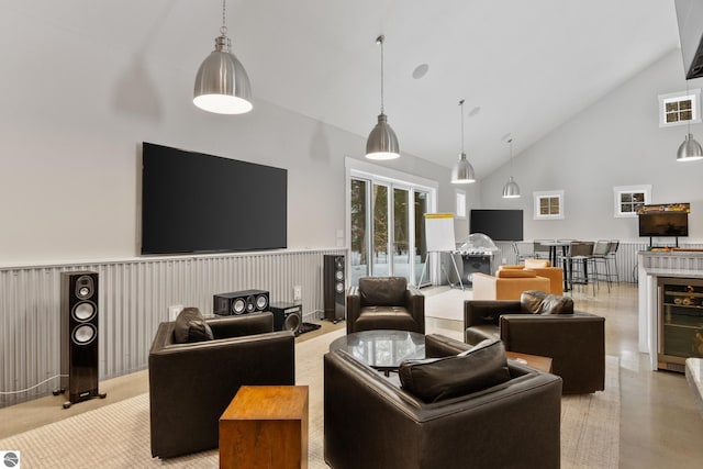 living room with high vaulted ceiling and beverage cooler