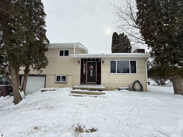 split level home with a garage