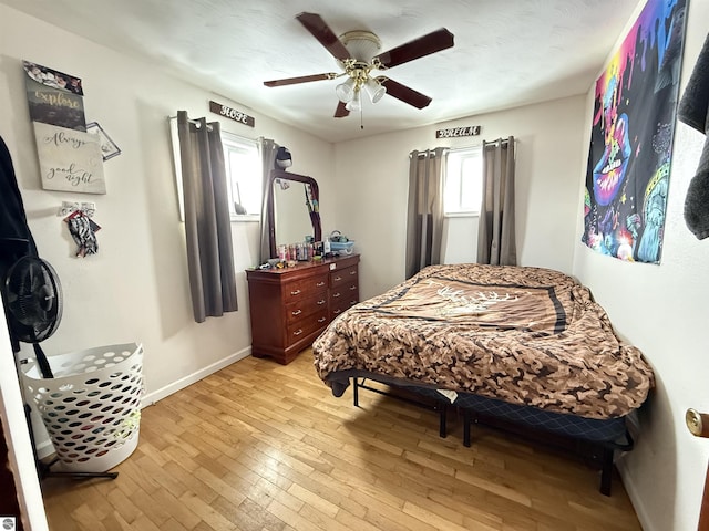 bedroom featuring ceiling fan and light wood-type flooring