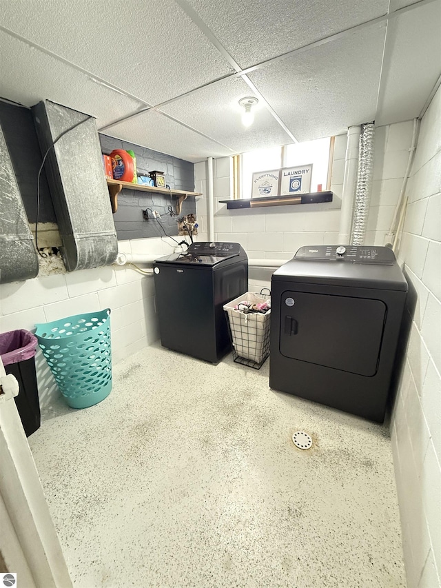 interior space featuring refrigerator and washer and clothes dryer