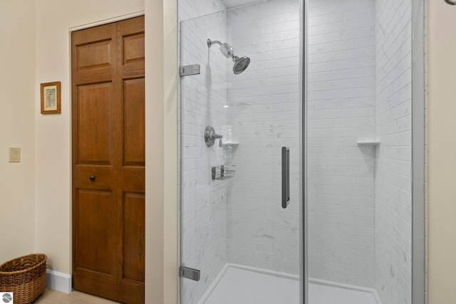 bathroom featuring walk in shower