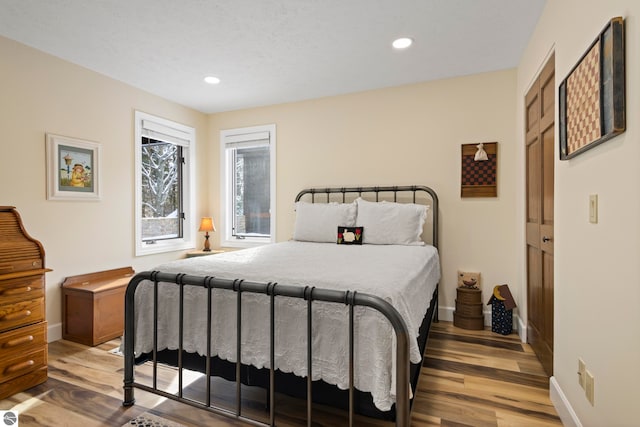 bedroom featuring hardwood / wood-style flooring