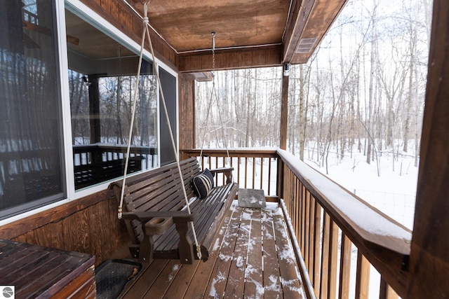 view of snow covered deck