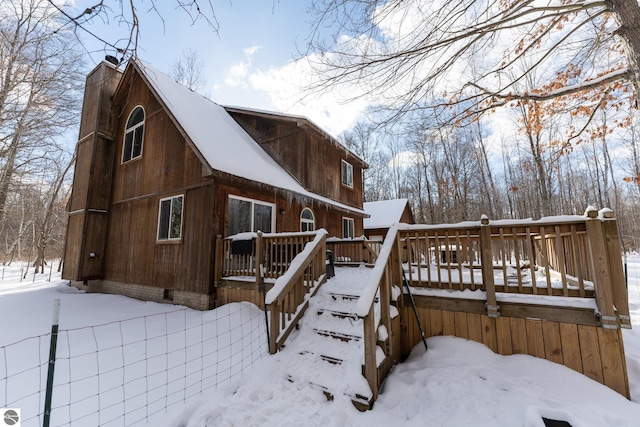 exterior space featuring a wooden deck