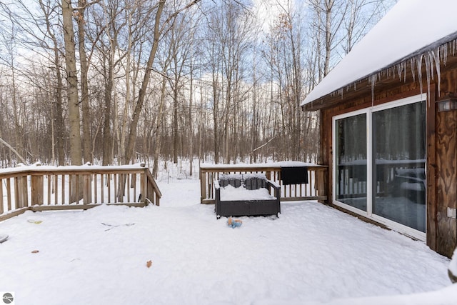 view of snow covered deck