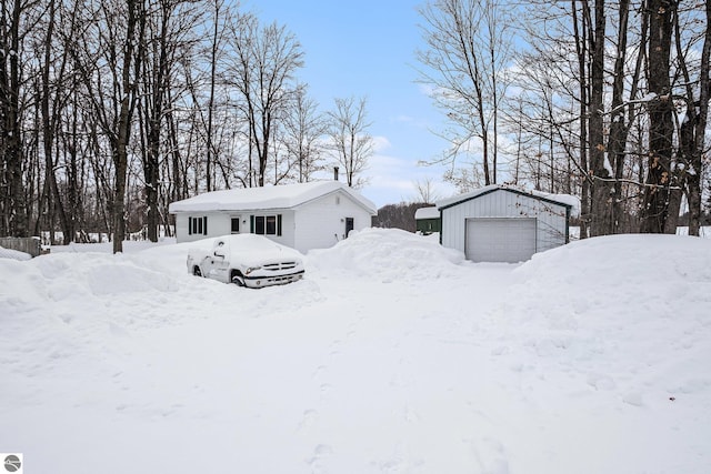 view of front of home with an outbuilding and a garage