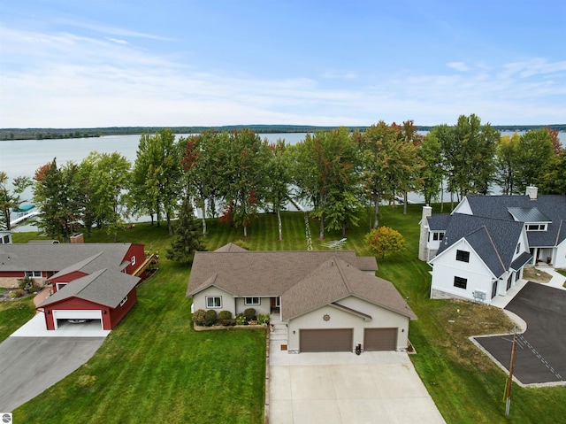 drone / aerial view featuring a water view