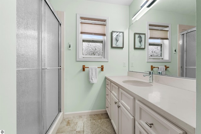 bathroom featuring vanity and walk in shower