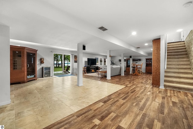 unfurnished living room featuring light hardwood / wood-style floors