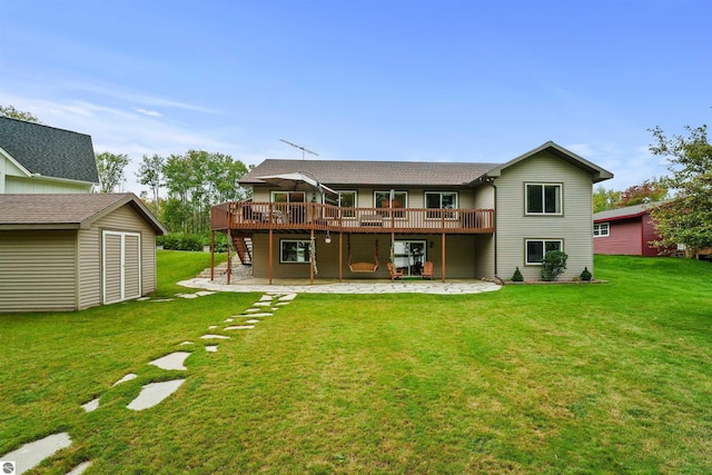 back of house with a patio area, a yard, a shed, and a wooden deck