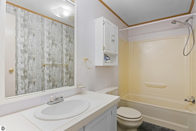 full bathroom with toilet, shower / bathtub combination, a textured ceiling, and ornamental molding