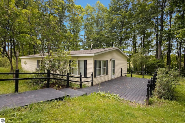 exterior space featuring a wooden deck