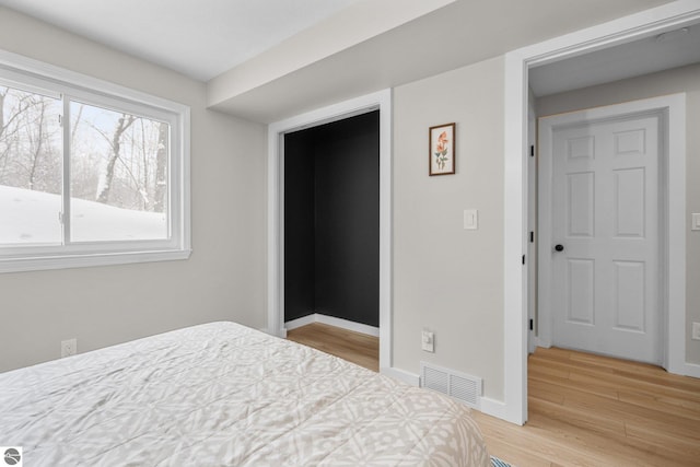 bedroom featuring light wood-type flooring