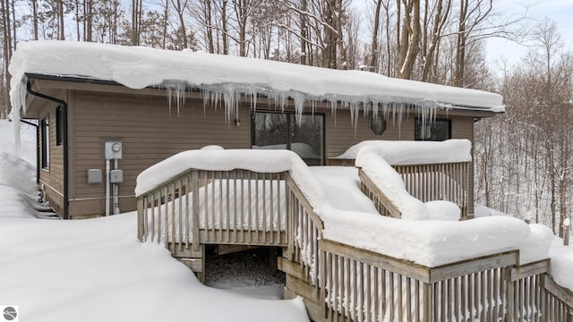 view of snow covered deck