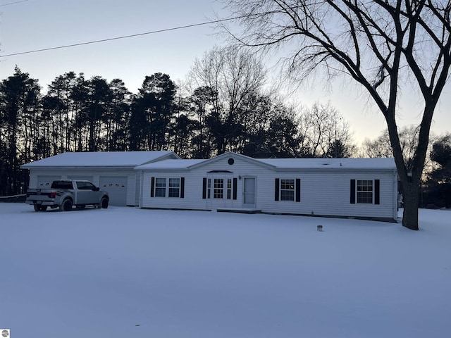 view of front of property featuring a garage