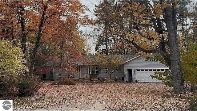 ranch-style home with a garage