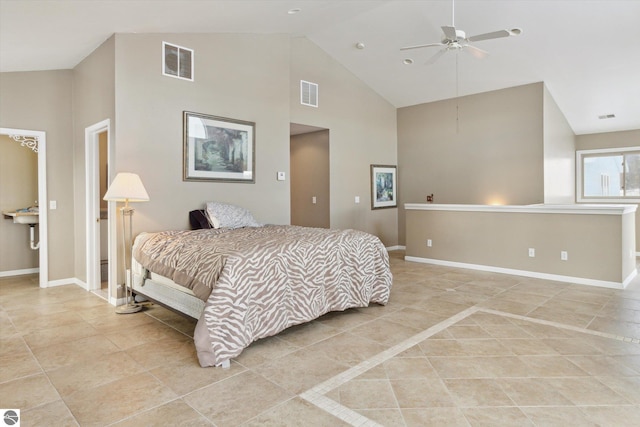 bedroom with high vaulted ceiling, baseboards, and visible vents