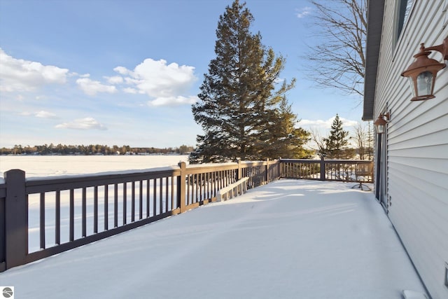 view of snow covered deck