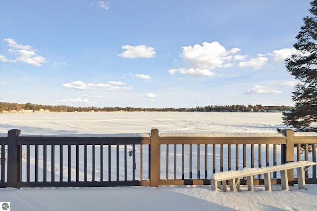 view of snow covered deck