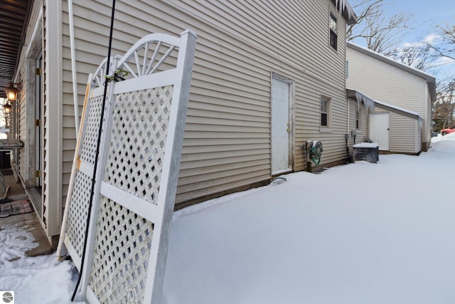 view of snow covered property