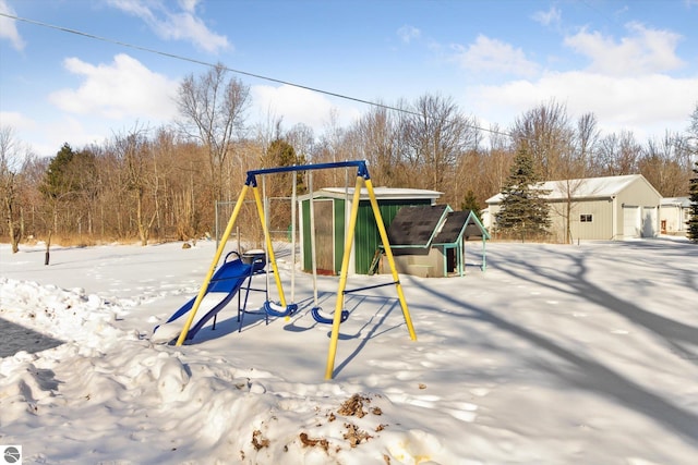 snow covered playground with a playground