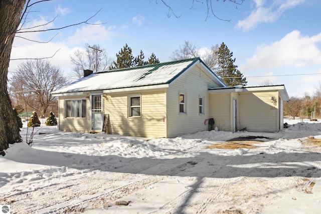 view of snow covered property