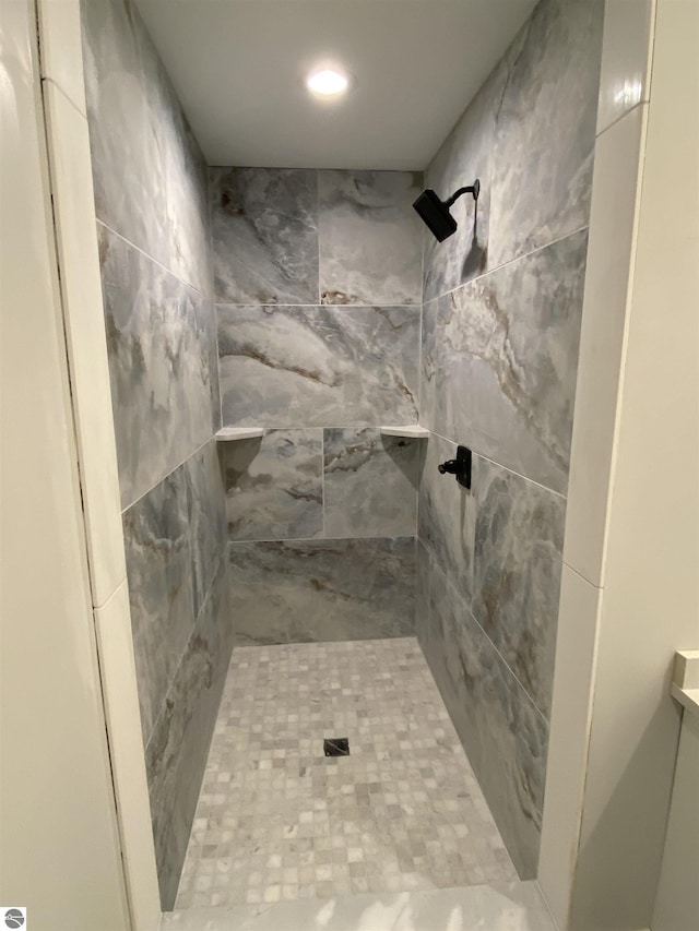 bathroom featuring a stall shower