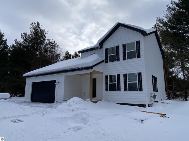 view of front of home with a garage