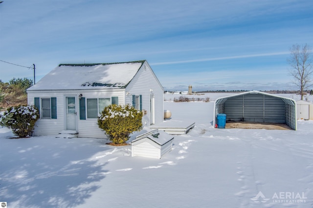 view of front of house featuring a detached carport