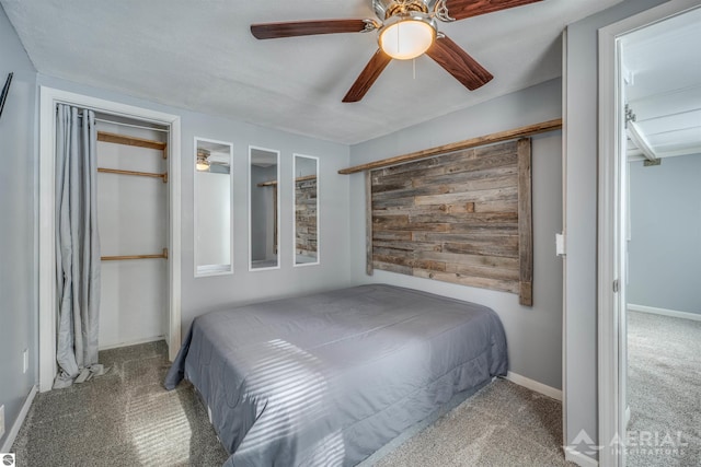 bedroom with carpet floors, a ceiling fan, and baseboards