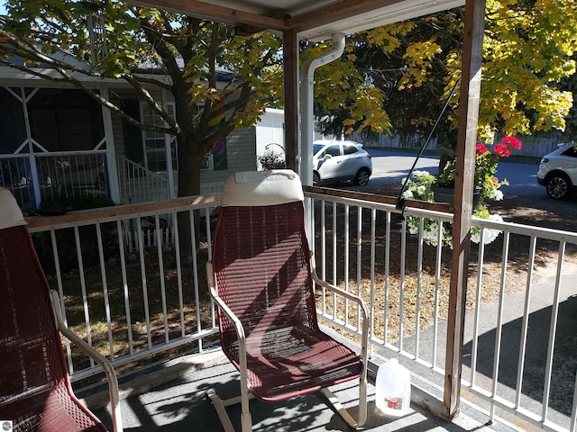 balcony featuring a porch