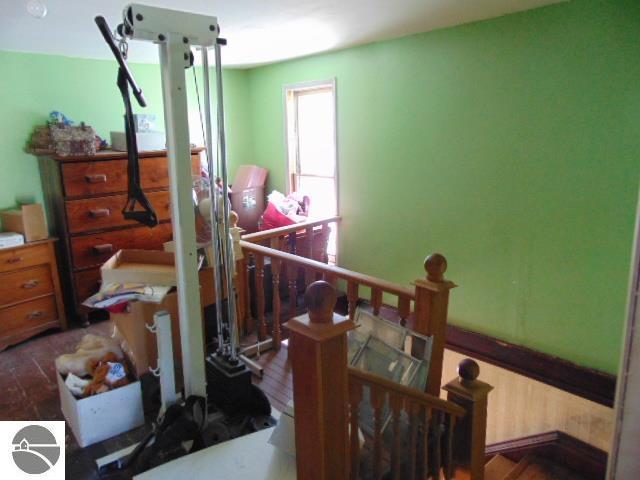 bedroom featuring wood finished floors