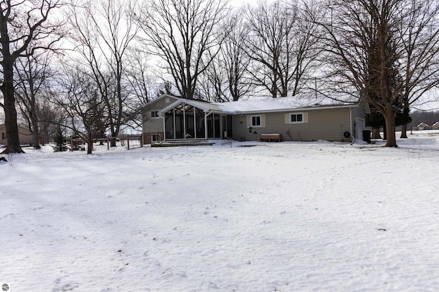 view of front facade featuring a sunroom