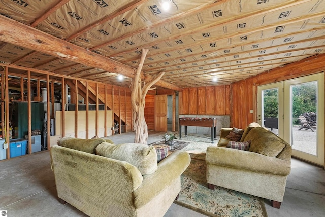 living area with concrete floors