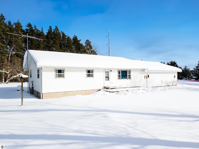 view of snow covered property