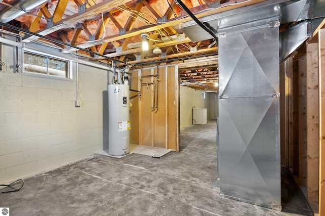 basement with heating unit and electric water heater