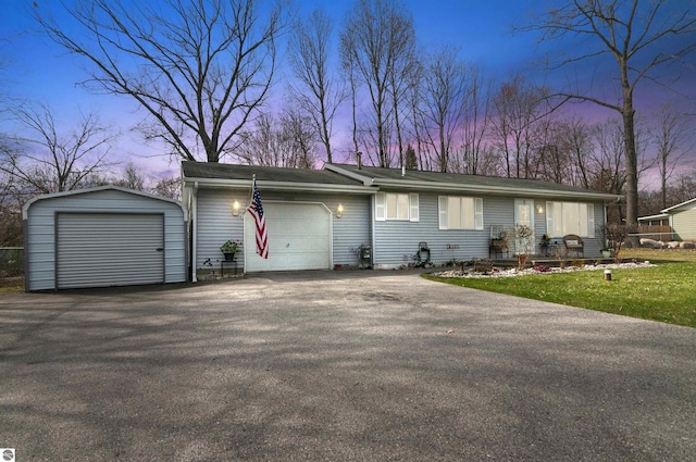 view of front of property featuring a garage and driveway