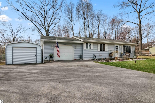 ranch-style home featuring a front yard and an attached garage