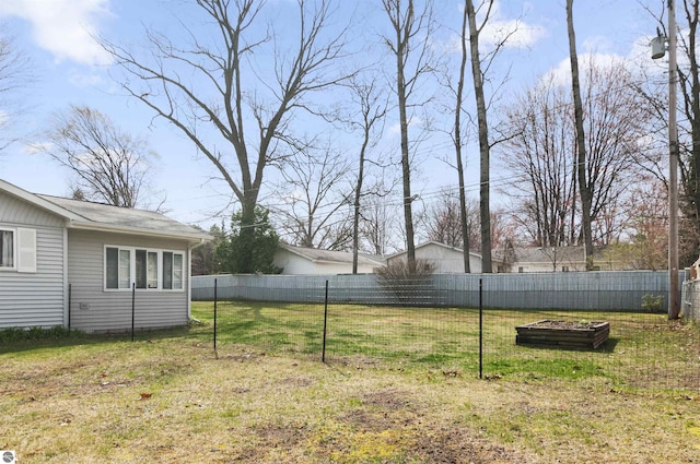 view of yard with a fenced backyard