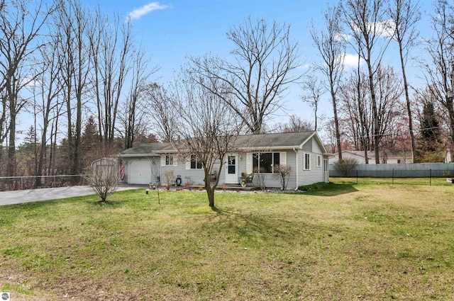 ranch-style house with concrete driveway, a front lawn, an attached garage, and fence